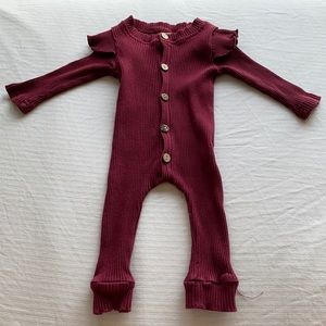 Button up baby romper with ruffle shoulders